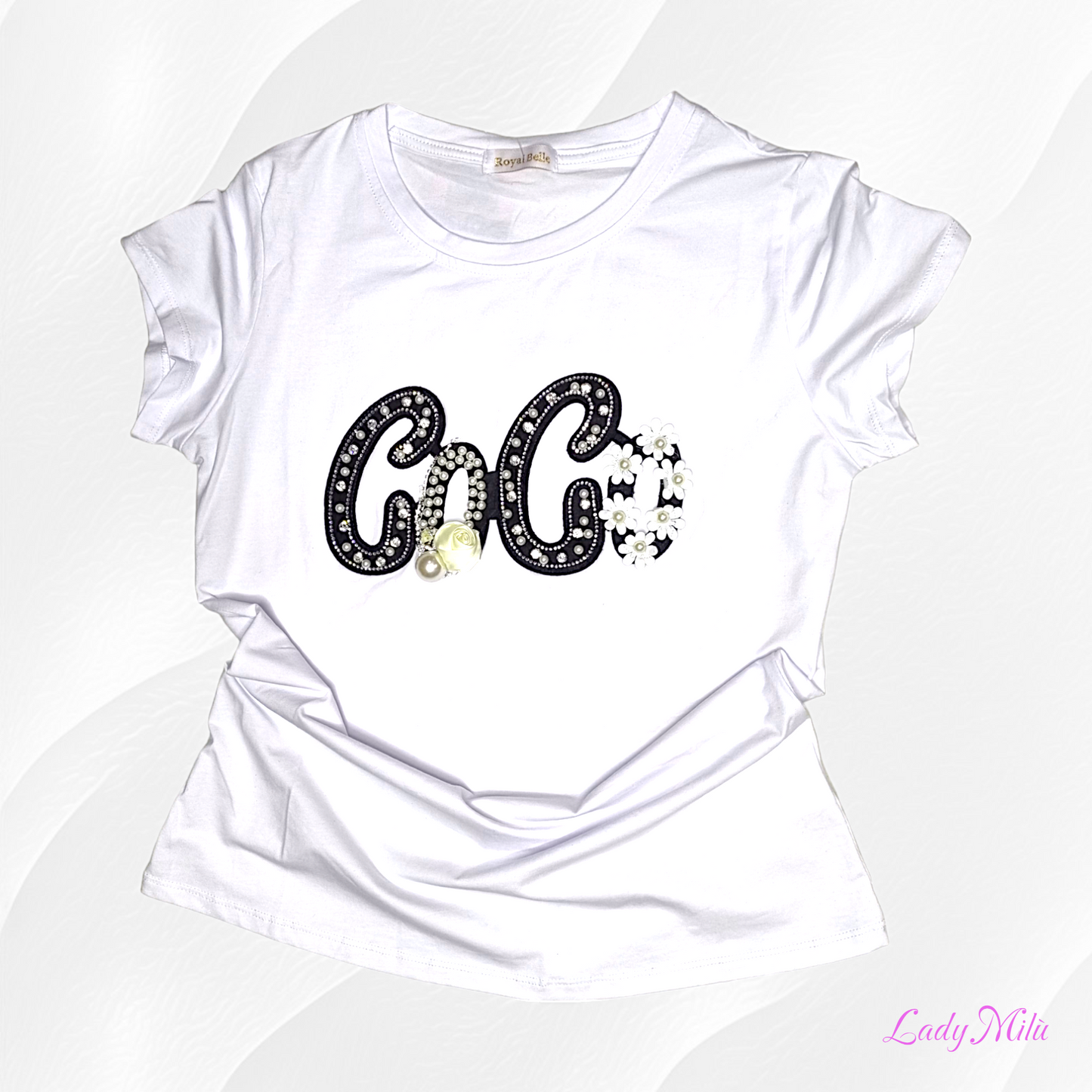 Tshirt bianca con applicazioni gioiello