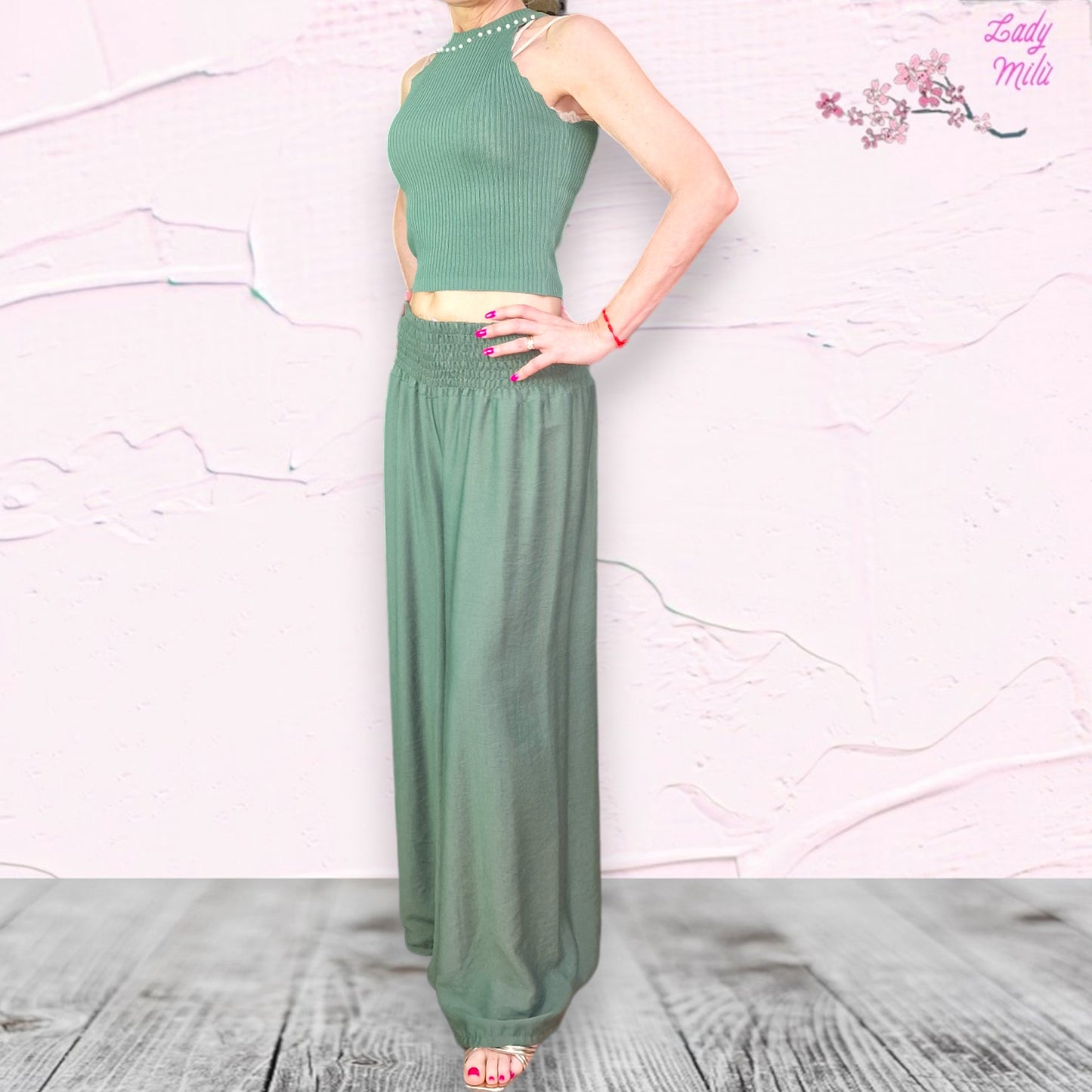 Top verde con perline