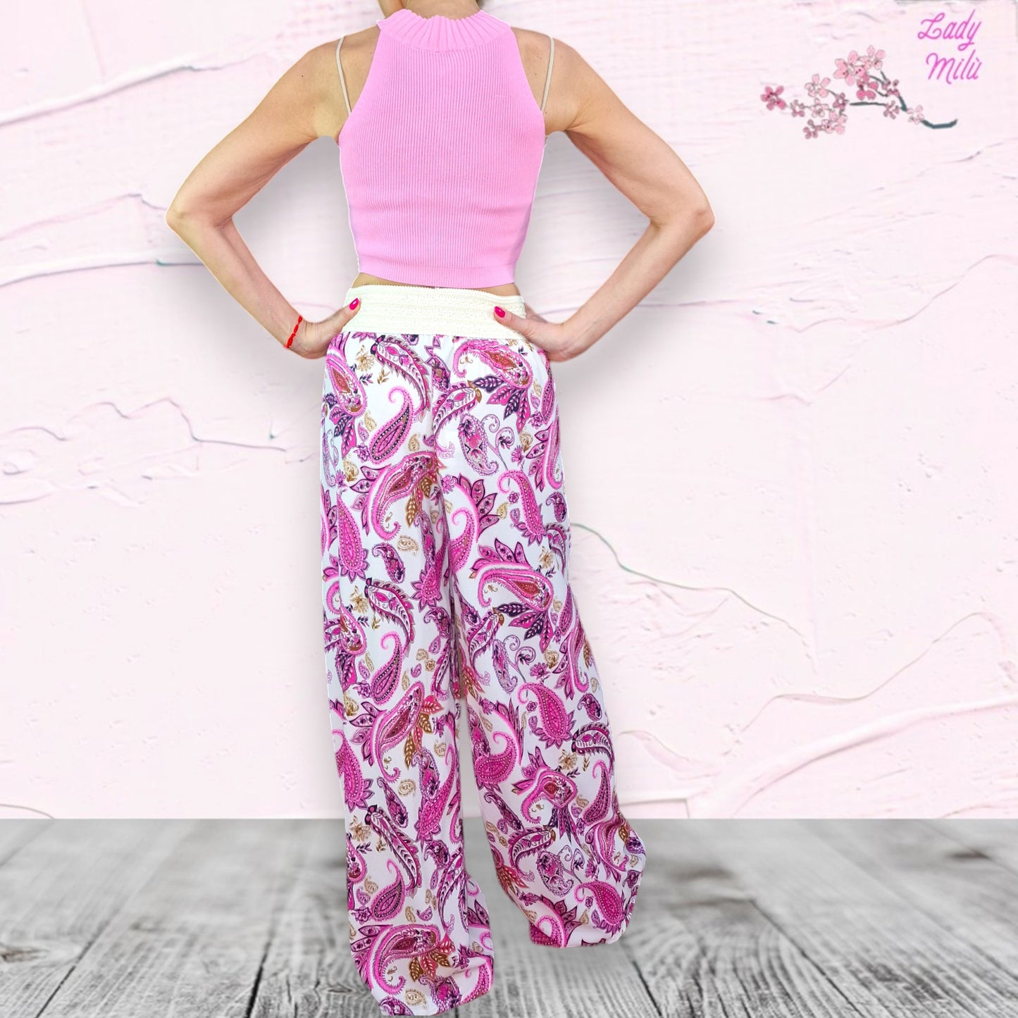 Top fucsia con perline