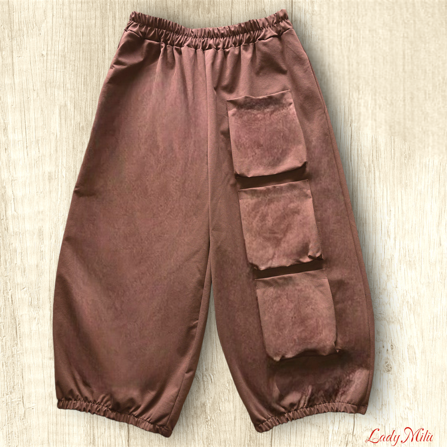Pantalone marrone bruciato con tasconi