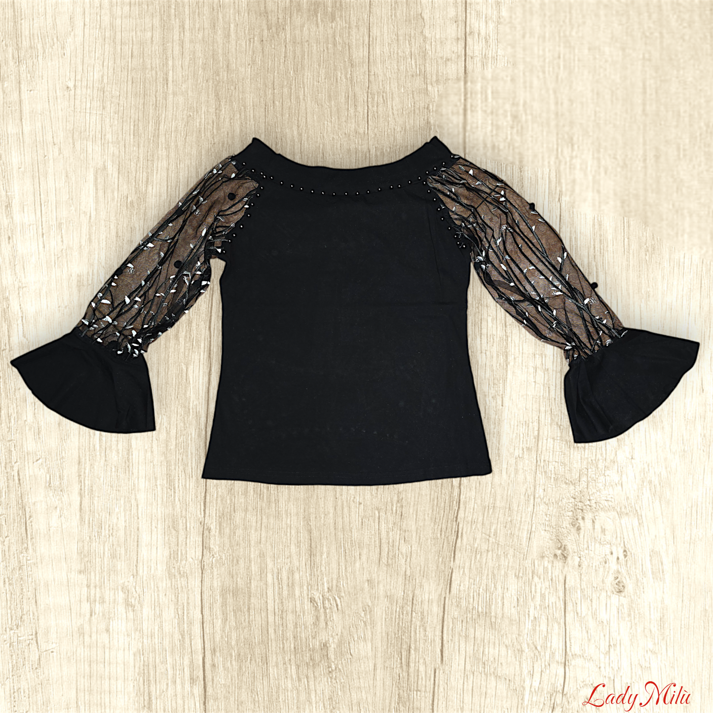 Maglia nera maniche trasparenti con ricami florealii argento