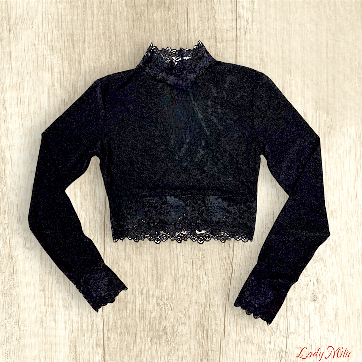 Maglia trasparente nera con bordi in pizzo