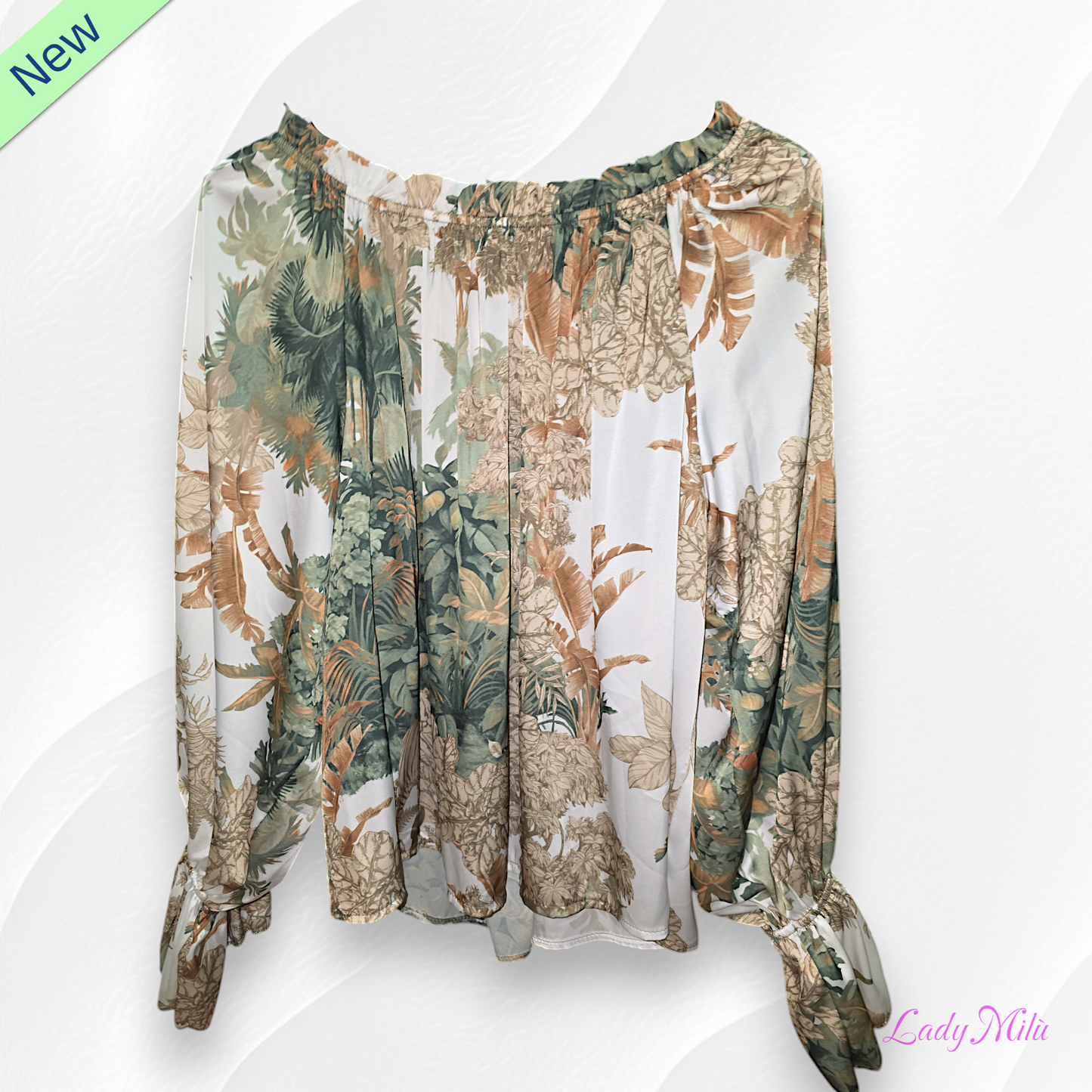 Blusa verde e beige con fiori