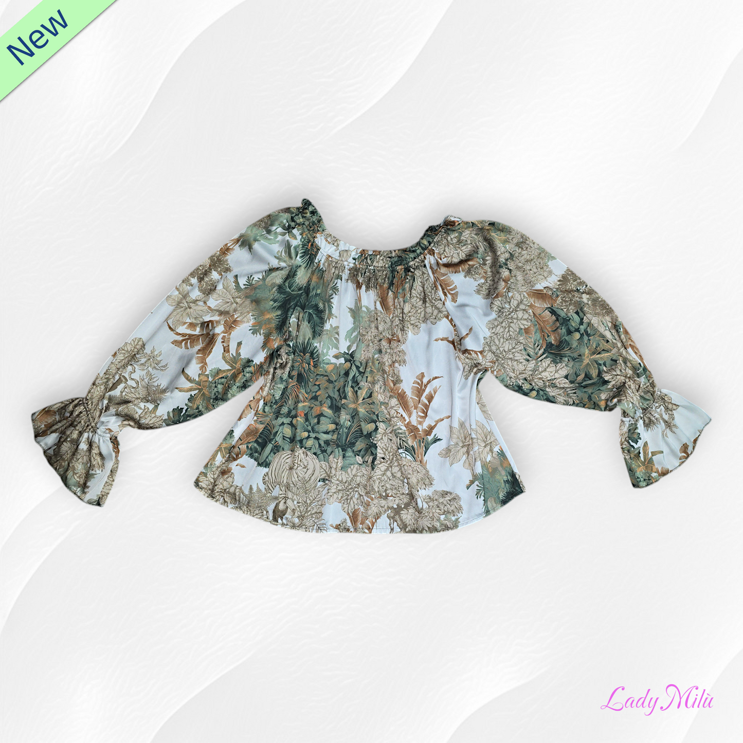 Blusa verde e beige con fiori