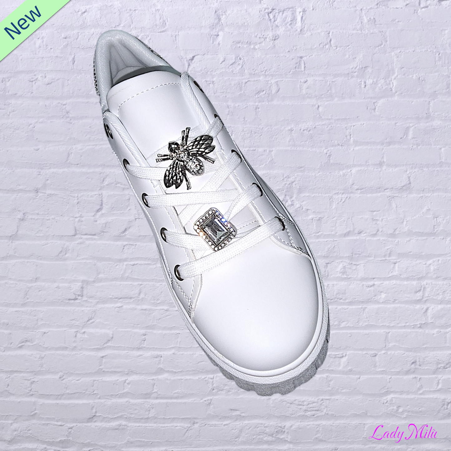Sneakers bianche con applicazioni gioiello