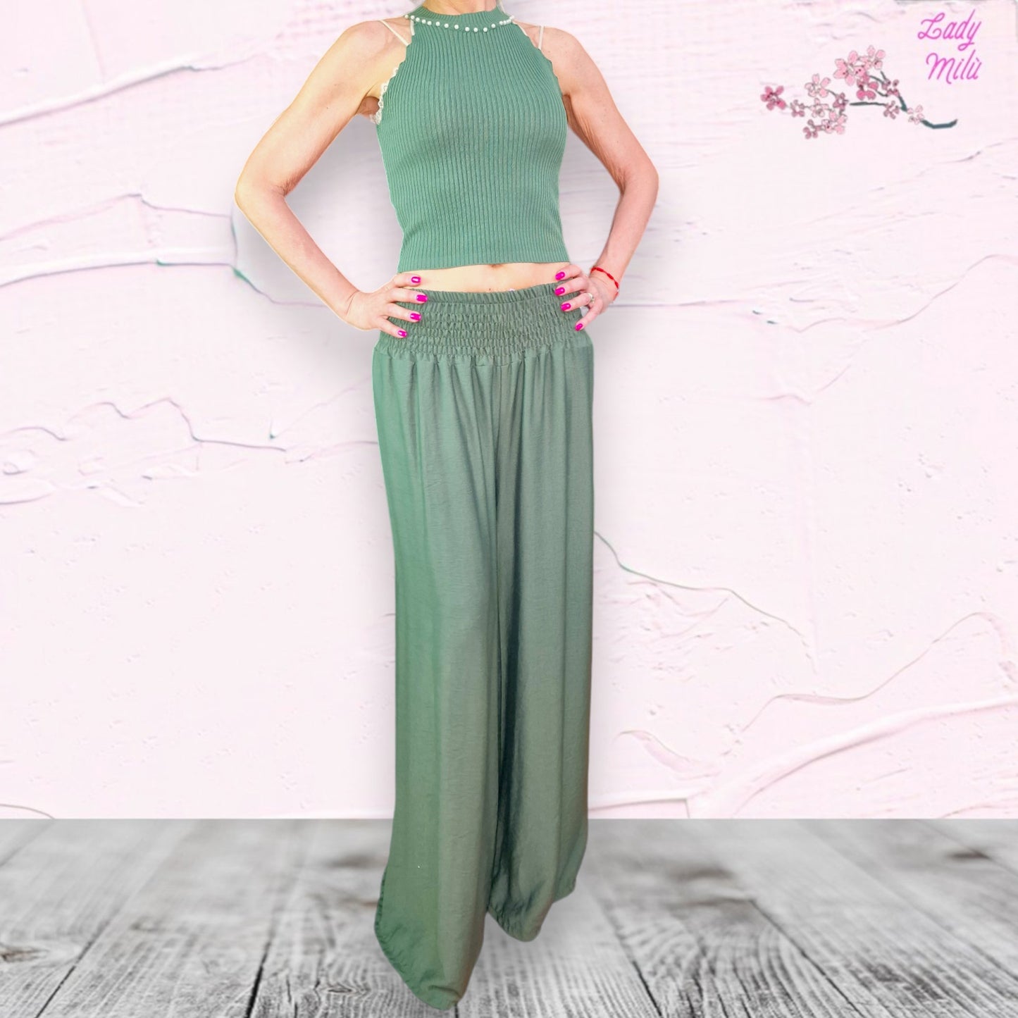 Top verde con perline