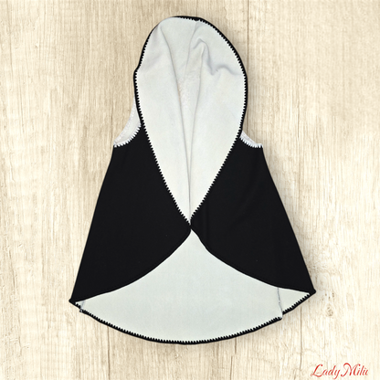 Gilet bianco e nero con smerli