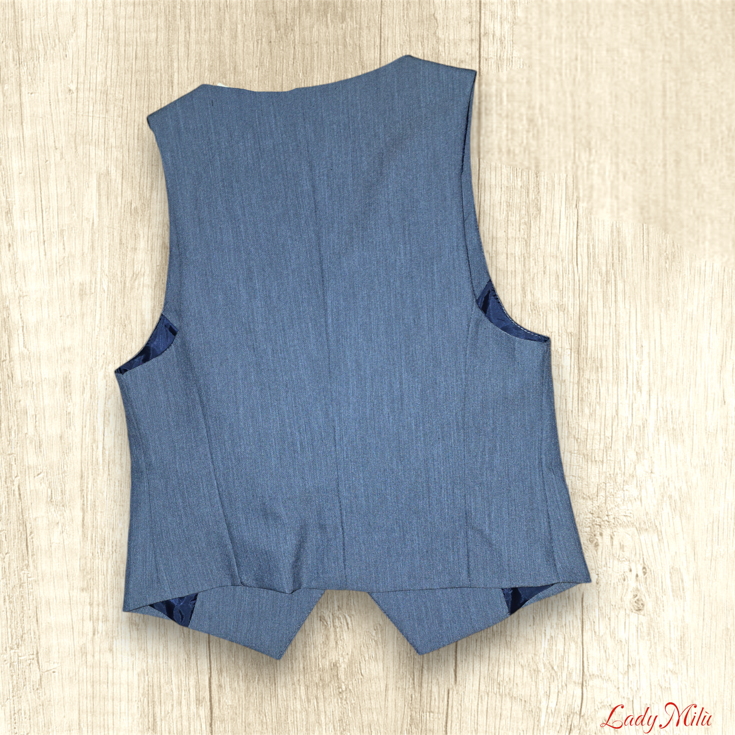 Gilet azzurro  polvere