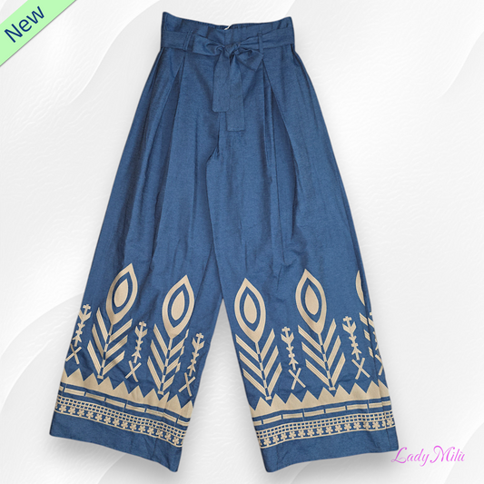Jeans scuro a zampa con disegni cognac