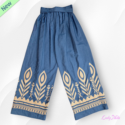 Jeans scuro a zampa con disegni cognac