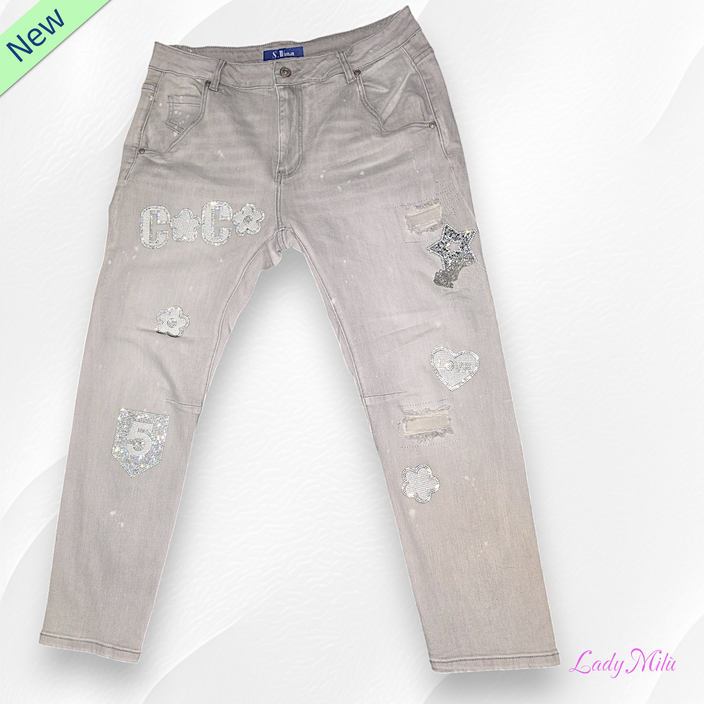 Jeans chiaro con strass e perline