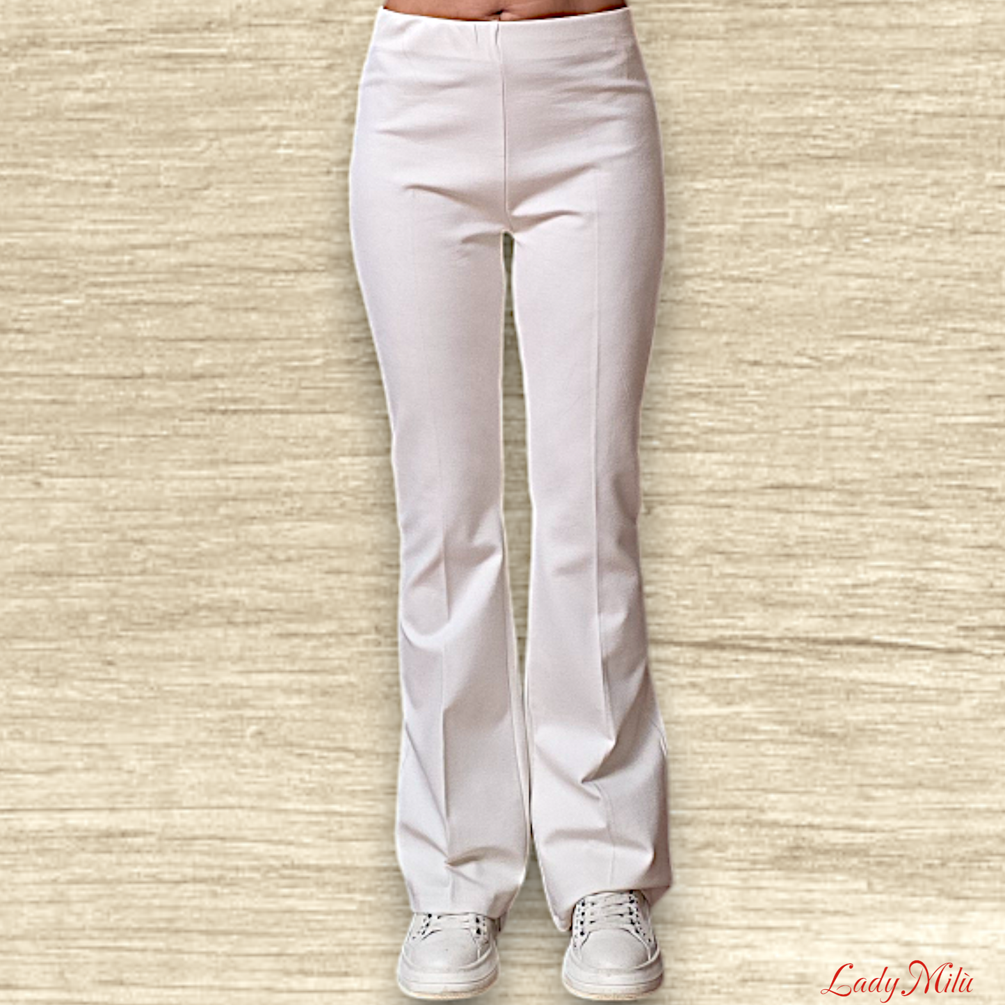 Pantalone zampa crema