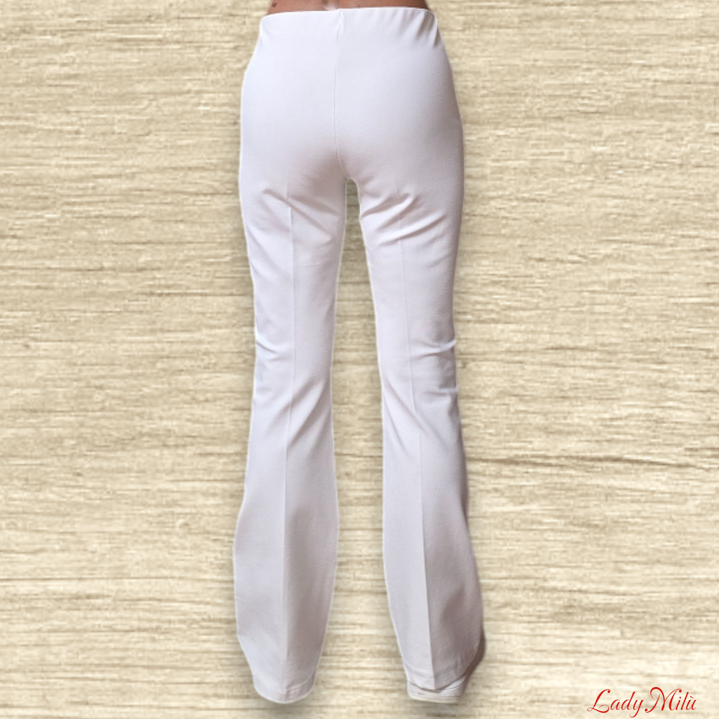 Pantalone zampa crema